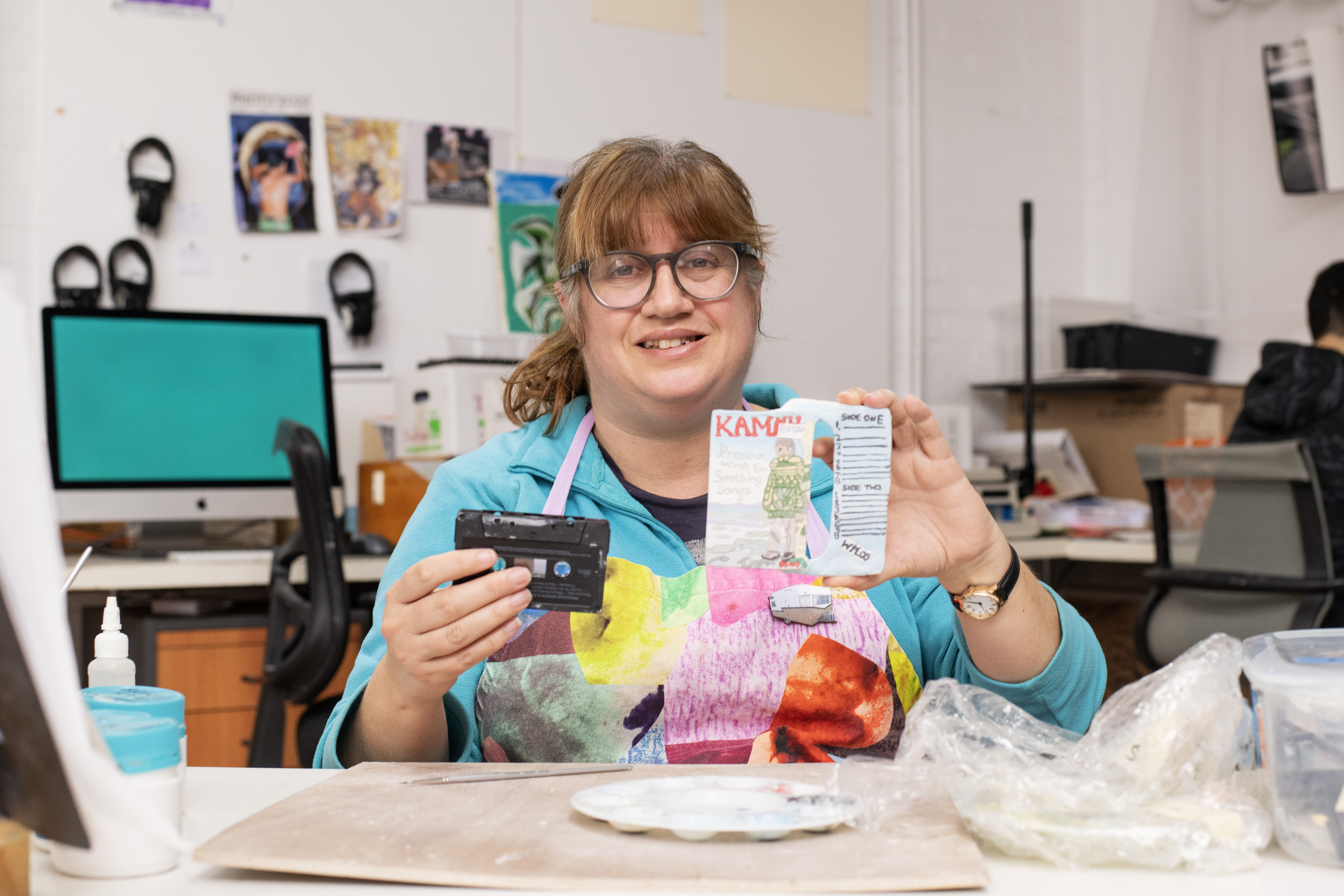 Lisa Reid making ceramic sculptures in Arts Project Australia's studio