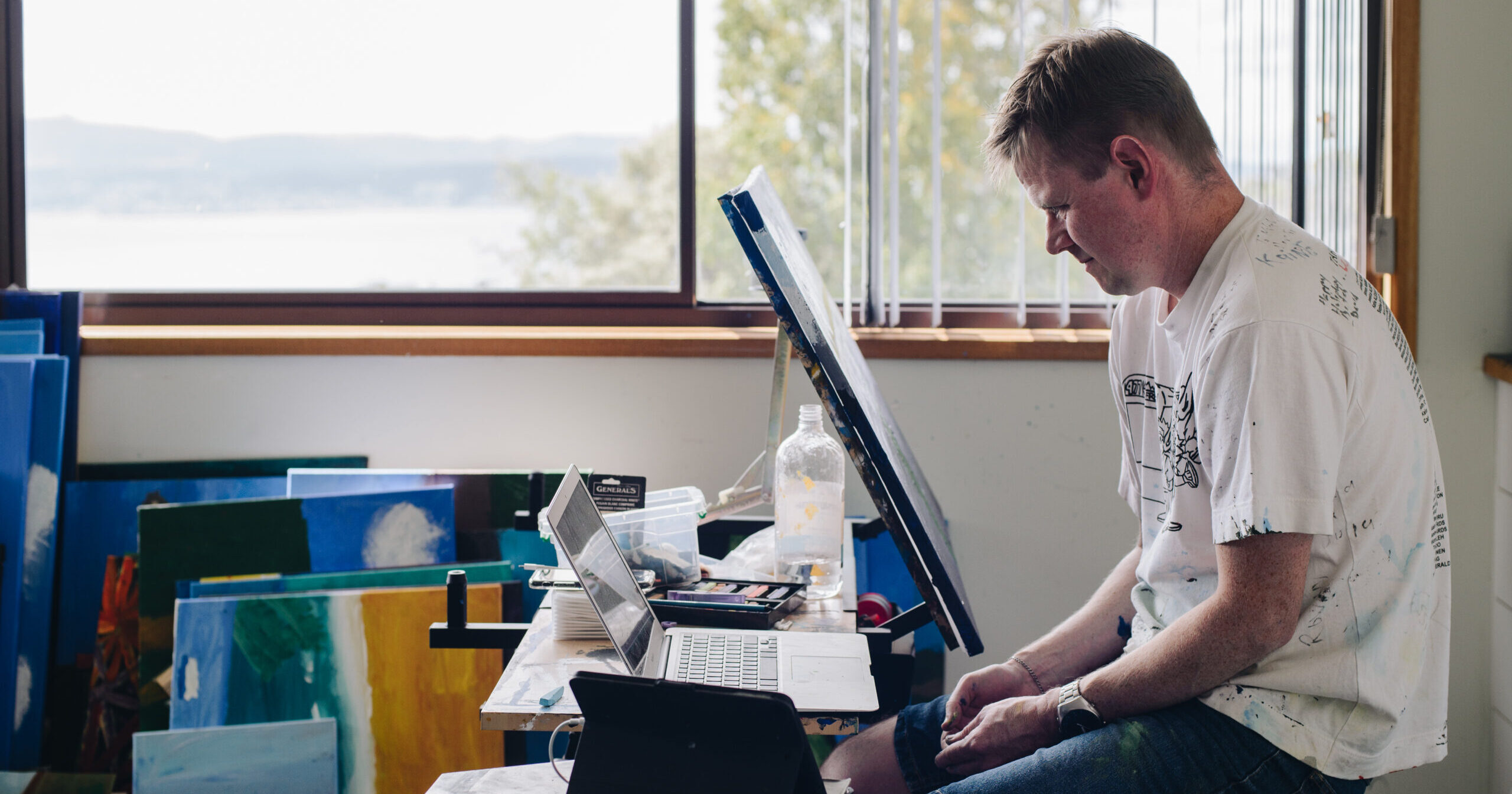 Arts Project Australia Online program artists Michael McQuillan in his Hobart home studio