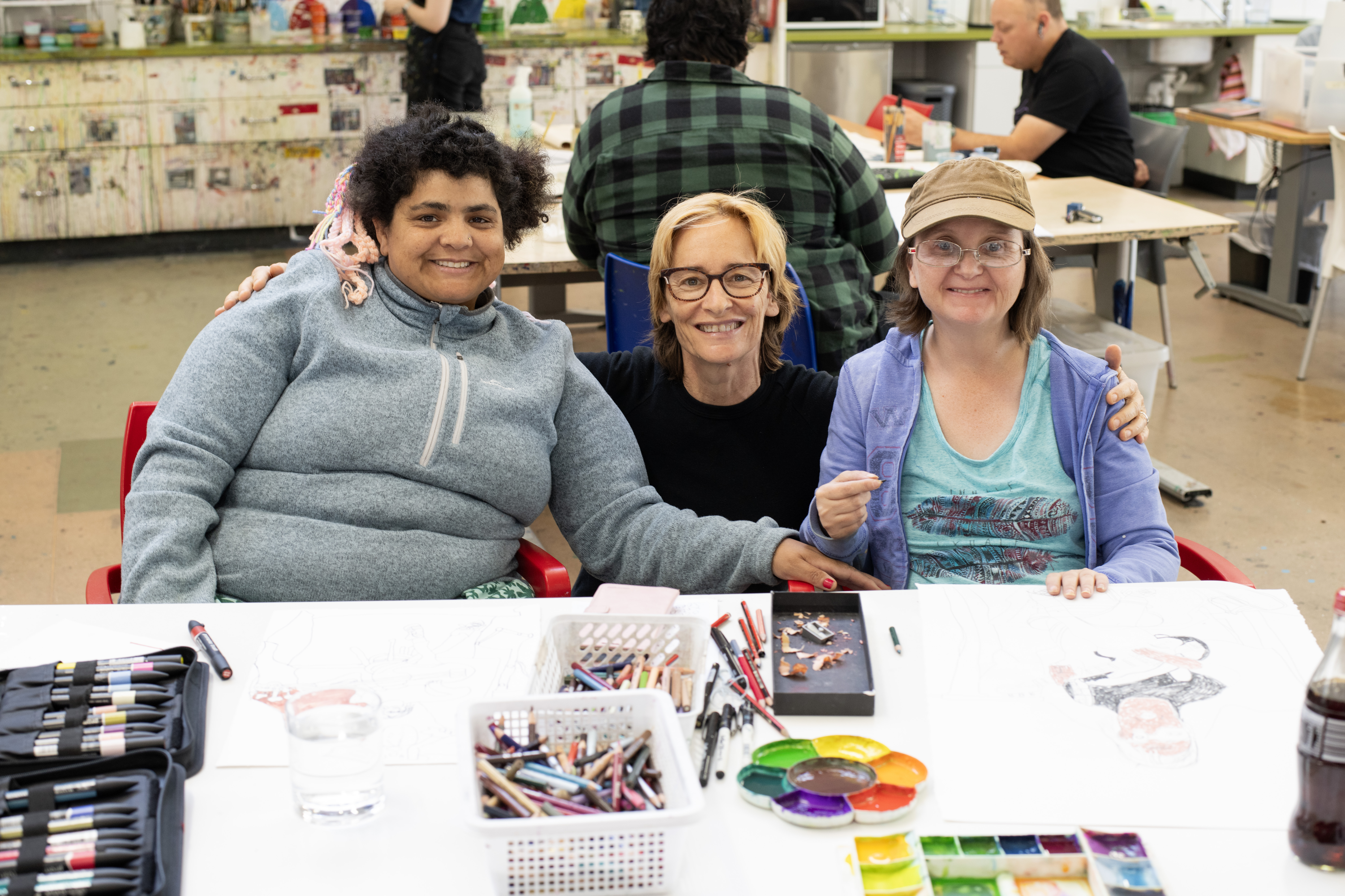Left to right: APA artist Rakhi James, Janet English and APA artist Samantha Ashdown in the APA studio